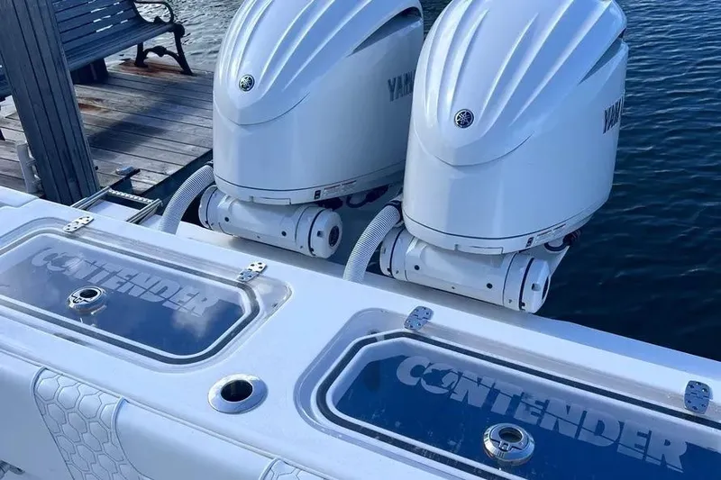  Yacht Photos Pics 2024 Contender 30 Tournament boat with dual Yamaha outboard engines at dock.