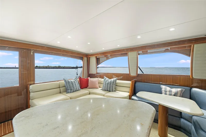  Yacht Photos Pics Luxurious interior of 2009 Viking 50 Convertible yacht with ocean view.