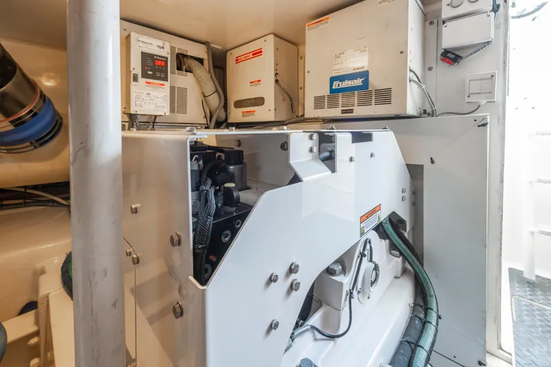  Yacht Photos Pics Engine room of 2009 Viking 50 Convertible yacht with mechanical equipment and wiring.