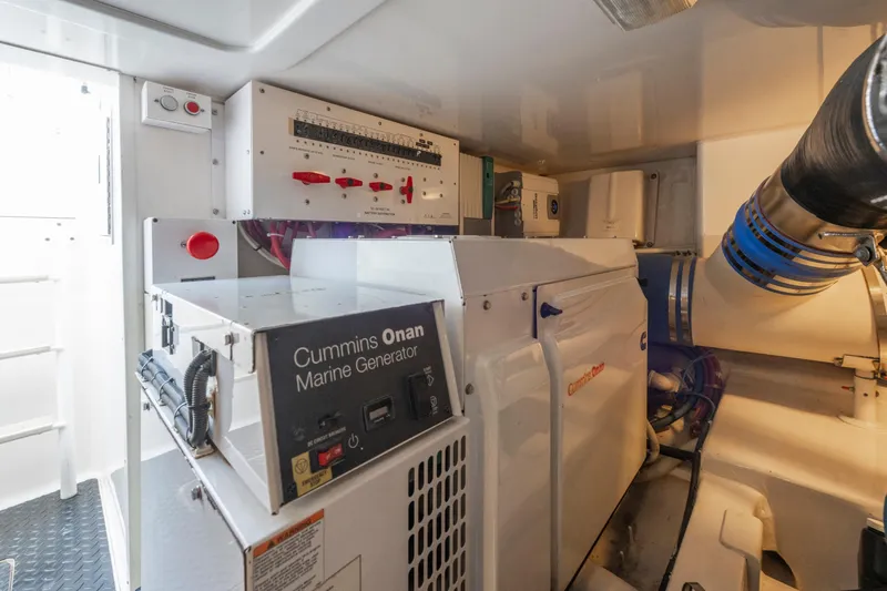  Yacht Photos Pics Engine room of 2009 Viking 50 Convertible with Cummins Onan marine generator.