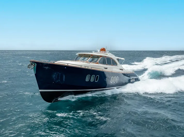 Shaken Not Stirred Yacht Photos Pics 2019 Zeelander Z55 yacht cruising on open sea under clear blue sky.