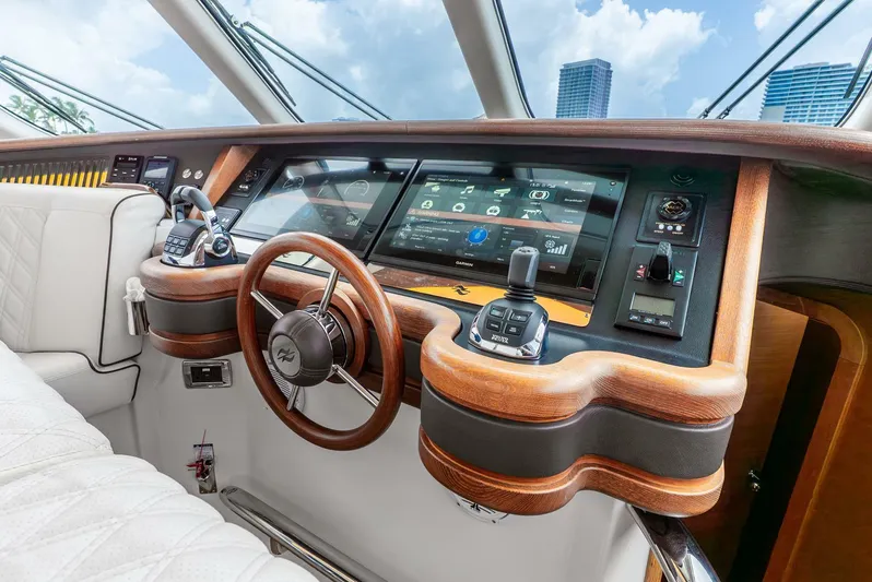 Shaken Not Stirred Yacht Photos Pics 2019 Zeelander Z55 yacht helm with modern controls and luxurious wood finish.