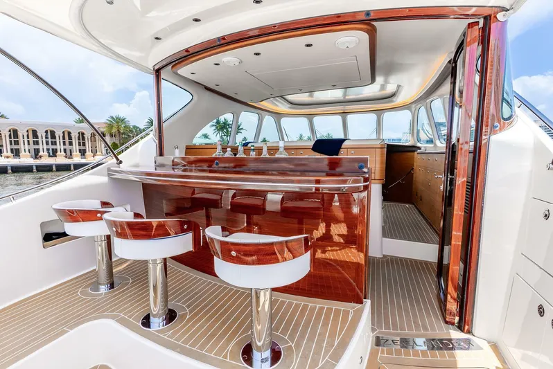 Shaken Not Stirred Yacht Photos Pics Luxurious 2019 Zeelander Z55 yacht interior with elegant bar and seating area.