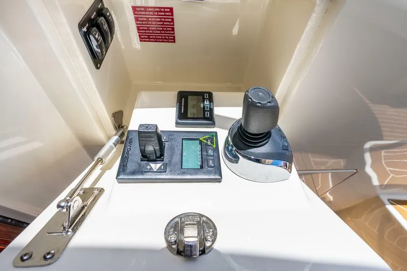 Shaken Not Stirred Yacht Photos Pics Control panel of 2019 Zeelander Z55 yacht with joystick and switches.