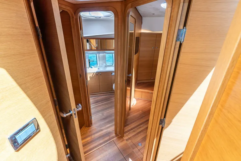 Shaken Not Stirred Yacht Photos Pics Interior of 2019 Zeelander Z55 yacht with wooden finishes and modern design.