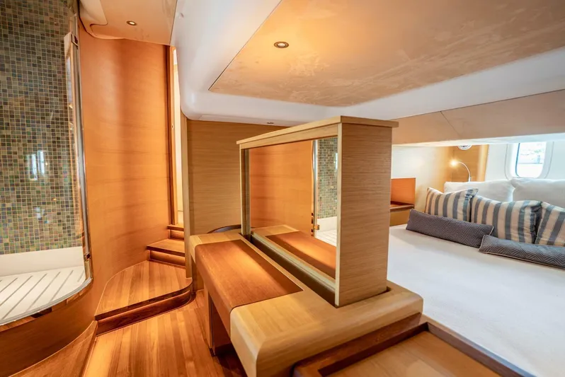 Shaken Not Stirred Yacht Photos Pics Luxurious interior of 2019 Zeelander Z55 yacht with elegant wood finishes and cozy seating.