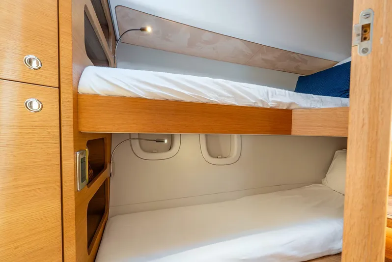 Shaken Not Stirred Yacht Photos Pics 2019 Zeelander Z55 yacht interior with wooden bunk beds and modern lighting.