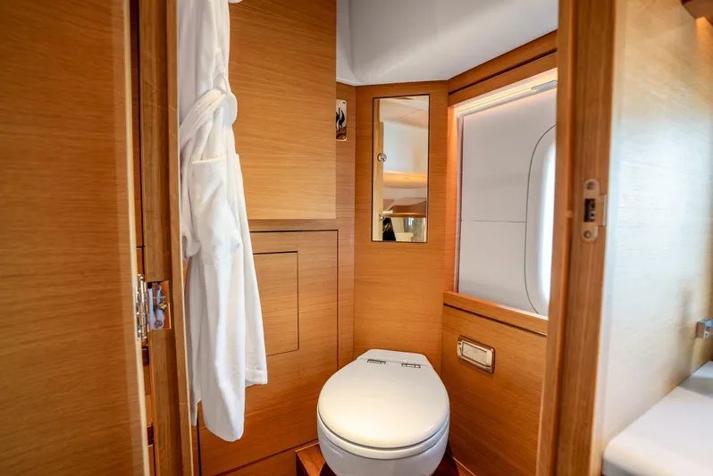Shaken Not Stirred Yacht Photos Pics Luxurious wooden bathroom interior on 2019 Zeelander Z55 yacht.