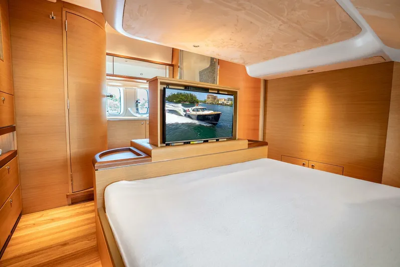 Shaken Not Stirred Yacht Photos Pics Luxurious interior of 2019 Zeelander Z55 yacht with wood finish and pop-up TV.
