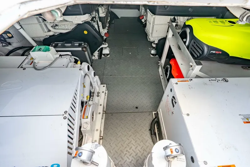 Shaken Not Stirred Yacht Photos Pics Engine room of 2019 Zeelander Z55 yacht with visible machinery and equipment.