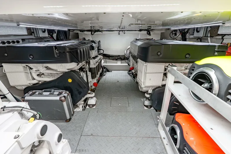 Shaken Not Stirred Yacht Photos Pics Engine room of 2019 Zeelander Z55 yacht, featuring dual engines and organized equipment.