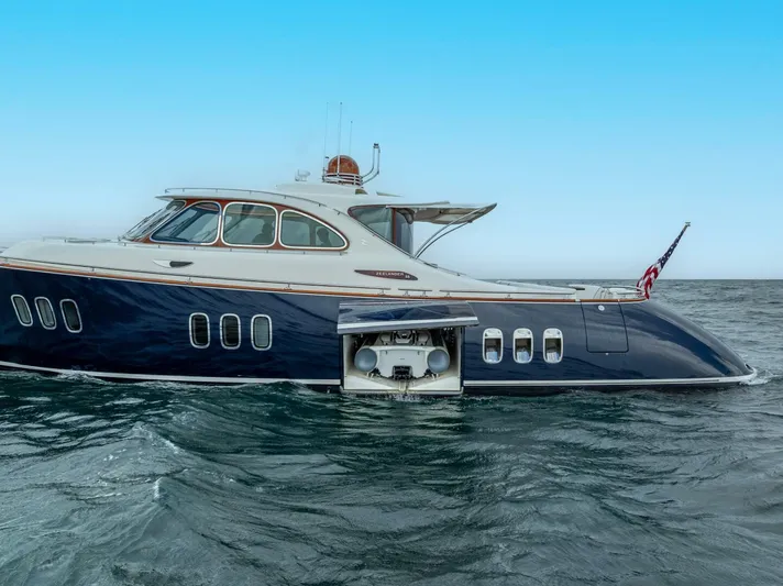Shaken Not Stirred Yacht Photos Pics 2019 Zeelander Z55 yacht on open water, featuring sleek design and American flag.