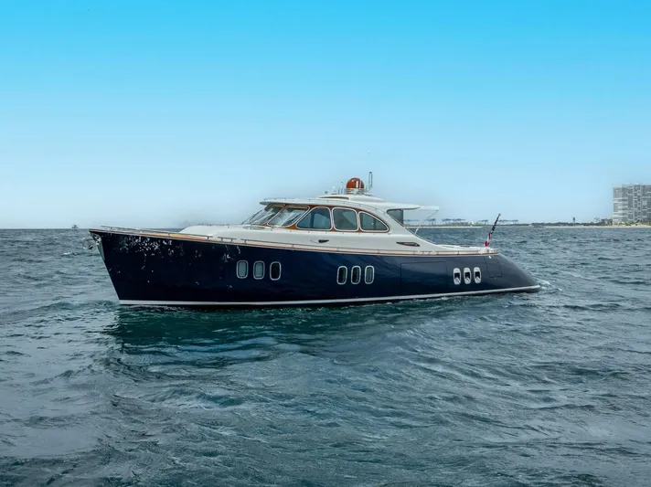Shaken Not Stirred Yacht Photos Pics 2019 Zeelander Z55 yacht cruising on open water under clear blue sky.