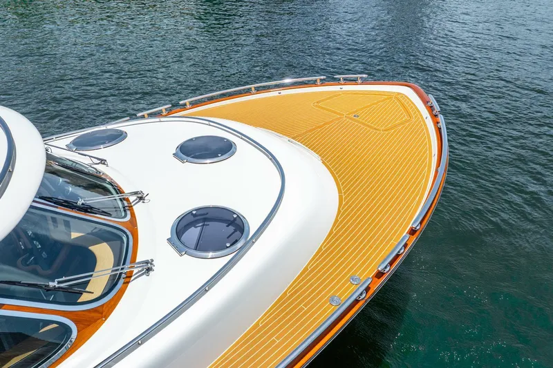 Shaken Not Stirred Yacht Photos Pics 2019 Zeelander Z55 yacht with sleek design and wooden deck on water.