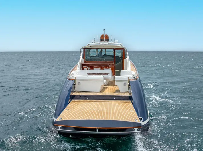 Shaken Not Stirred Yacht Photos Pics 2019 Zeelander Z55 yacht cruising on open sea, rear view.