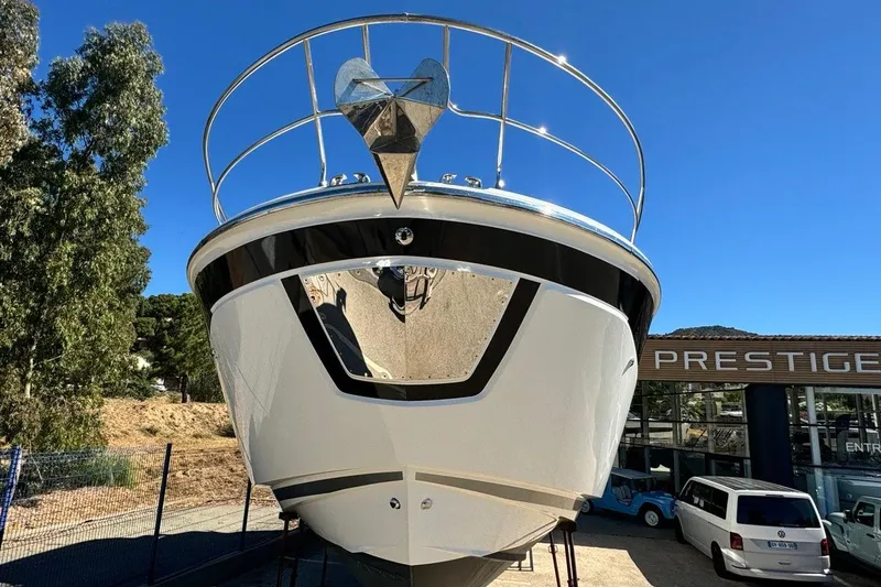  Yacht Photos Pics Prestige F4.9 yacht, 2026 model, displayed outdoors under clear blue sky.