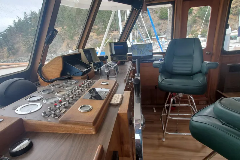 Regal Countess Yacht Photos Pics Interior of 1965 Tacoma Boat Works Bill Garden Motor Yacht, featuring vintage controls and seating.