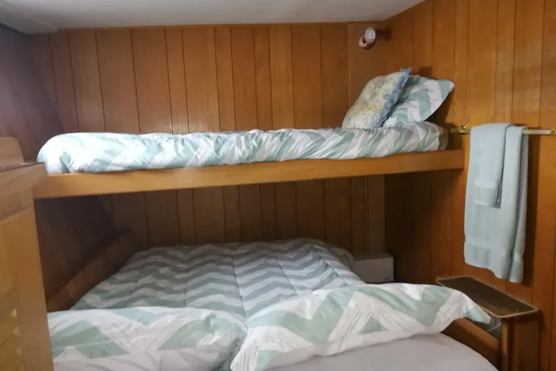 Regal Countess Yacht Photos Pics Cozy wooden cabin with bunk beds on 1965 Tacoma Boat Works Bill Garden Motor Yacht.