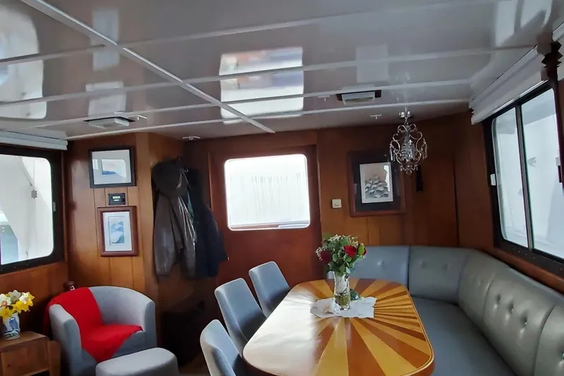 Regal Countess Yacht Photos Pics Interior of 1965 Tacoma Boat Works Bill Garden Motor Yacht, featuring elegant dining area.