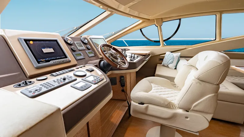 Christine Yacht Photos Pics Luxurious 2011 Azimut 58 Flybridge yacht interior with modern helm and plush seating.
