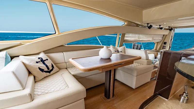 Christine Yacht Photos Pics Luxurious interior of 2011 Azimut 58 Flybridge yacht with ocean view.