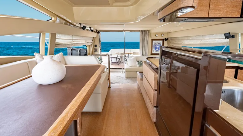 Christine Yacht Photos Pics Luxurious interior of 2011 Azimut 58 Flybridge yacht with ocean view.