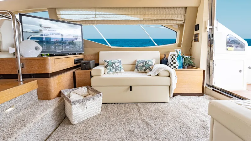 Christine Yacht Photos Pics Luxurious interior of 2011 Azimut 58 Flybridge yacht with ocean view and elegant decor.