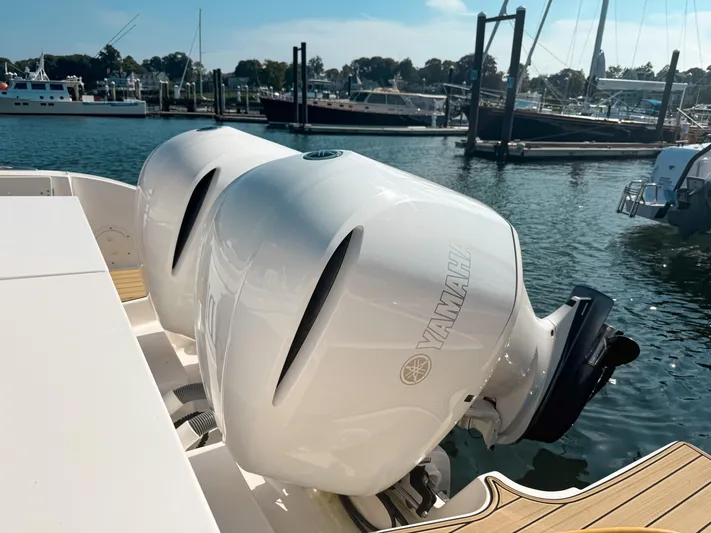 Adios Yacht Photos Pics 2018 Pursuit DC 325 Dual Console with Yamaha outboard engines docked at marina.