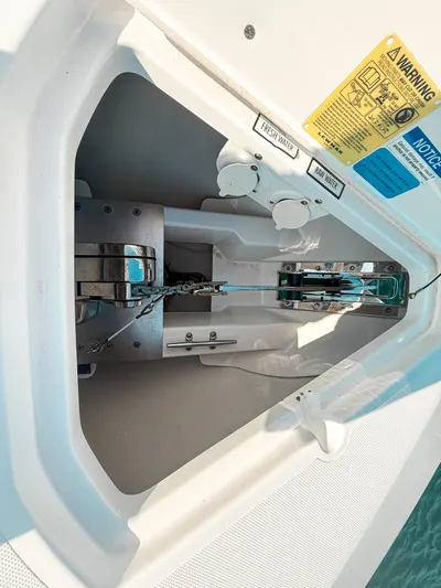 Adios Yacht Photos Pics Anchor compartment of 2018 Pursuit DC 325 Dual Console boat with water access points.