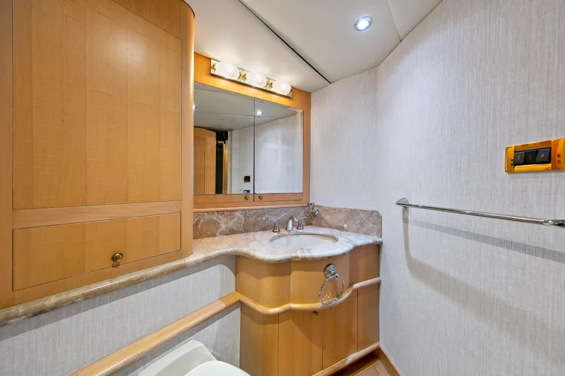 Fansea Yacht Photos Pics Luxurious bathroom in 1998 Westport Sovereign yacht with wood cabinetry and marble countertop.