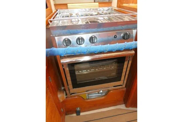 Wild Blue Yacht Photos Pics Stainless steel stove and oven in 1999 Island Packet 45 yacht kitchen.