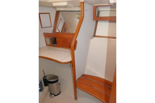 Wild Blue Yacht Photos Pics 1999 Island Packet 45 yacht interior with wooden accents and mirror.