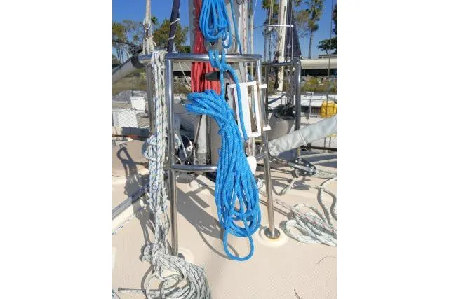Wild Blue Yacht Photos Pics Sailing ropes on deck of 1999 Island Packet 45 yacht, featuring blue and white lines.
