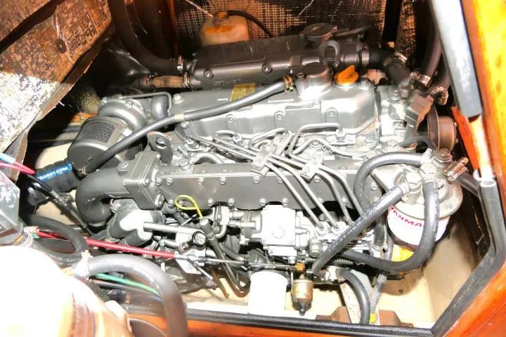 Wild Blue Yacht Photos Pics Engine compartment of a 1999 Island Packet 45 sailboat, showcasing detailed mechanical components.