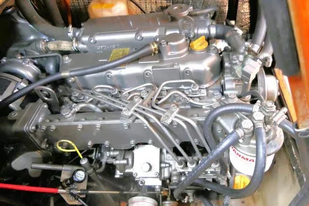 Wild Blue Yacht Photos Pics Engine of a 1999 Island Packet 45 sailboat, showcasing intricate mechanical components.