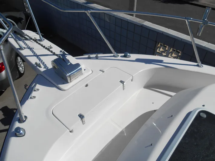 Strike Zone Yacht Photos Pics 2002 Grady-White 282 Sailfish boat deck with anchor and railing.