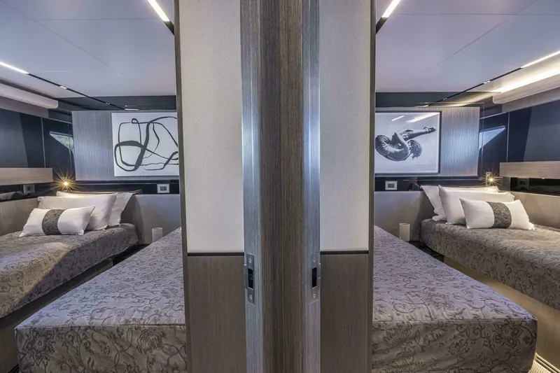 82 Pearl Yacht Photos Pics Luxurious twin bedroom interior on Pearl 82 yacht, 2026 model, featuring modern decor and elegant bedding.