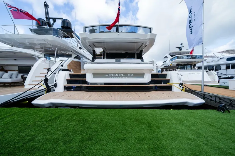 82 Pearl Yacht Photos Pics Luxury Pearl 82 yacht docked, showcasing sleek design and modern features, 2026 model.