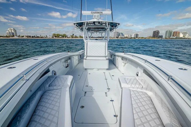  Yacht Photos Pics 2023 Yellowfin 36 Offshore boat with spacious deck and modern design on open water.