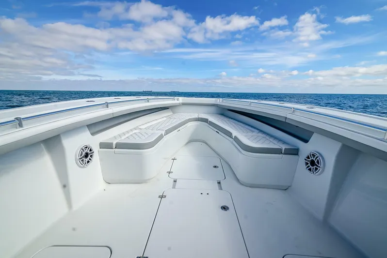  Yacht Photos Pics 2023 Yellowfin 36 Offshore boat deck with ocean view and clear sky.