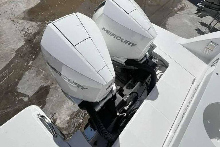  Yacht Photos Pics 2024 Bertram 28 CC boat with dual Mercury outboard engines, top view.