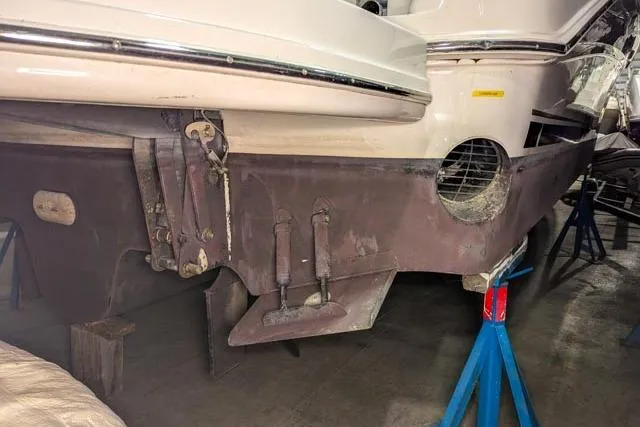 Tigress Yacht Photos Pics 2002 Sea Ray 550 Sundancer boat on stands, showing hull and propeller area.