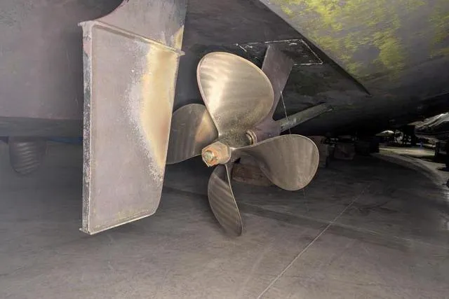 Tigress Yacht Photos Pics Propeller and rudder of 2002 Sea Ray 550 Sundancer yacht in dry dock.