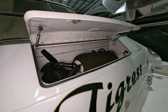 Tigress Yacht Photos Pics Open storage compartment on 2002 Sea Ray 550 Sundancer yacht, labeled "Tigress."