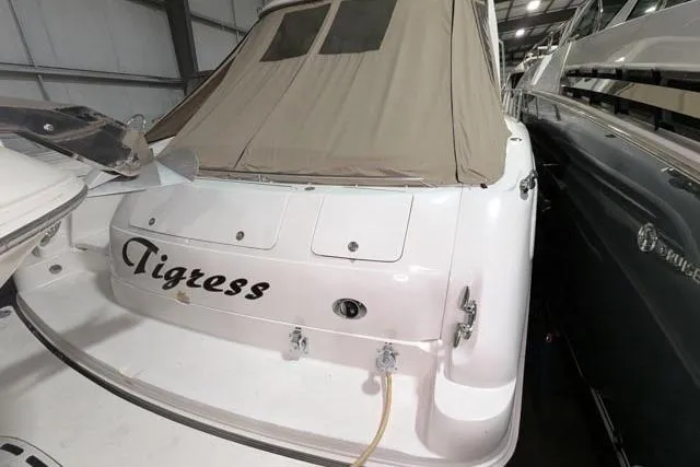 Tigress Yacht Photos Pics 2002 Sea Ray 550 Sundancer yacht named "Tigress" docked indoors.