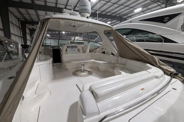 Tigress Yacht Photos Pics 2002 Sea Ray 550 Sundancer yacht interior, spacious seating, for sale in marina.