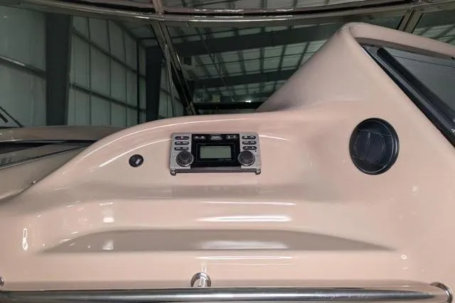 Tigress Yacht Photos Pics 2002 Sea Ray 550 Sundancer dashboard with control panel in a marina setting.