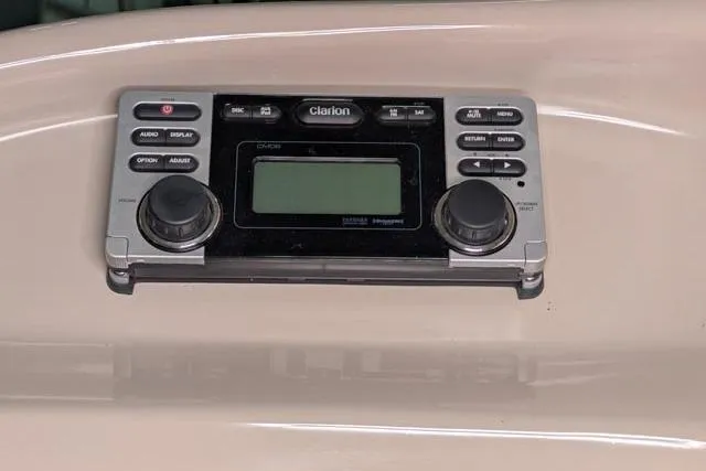 Tigress Yacht Photos Pics Clarion audio system on 2002 Sea Ray 550 Sundancer yacht dashboard.