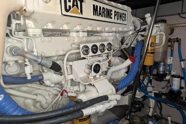 Tigress Yacht Photos Pics Engine room of 2002 Sea Ray 550 Sundancer with CAT Marine Power engine.