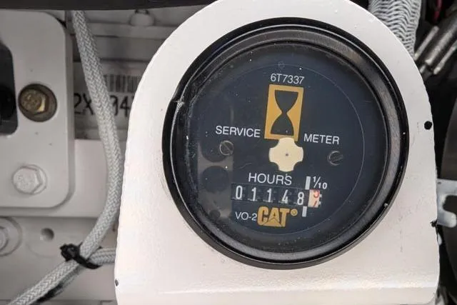 Tigress Yacht Photos Pics Service meter on 2002 Sea Ray 550 Sundancer, showing 1148 hours.